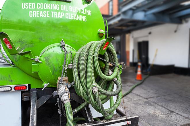 routine pumping of grease trap at a cafeteria in El Granada CA